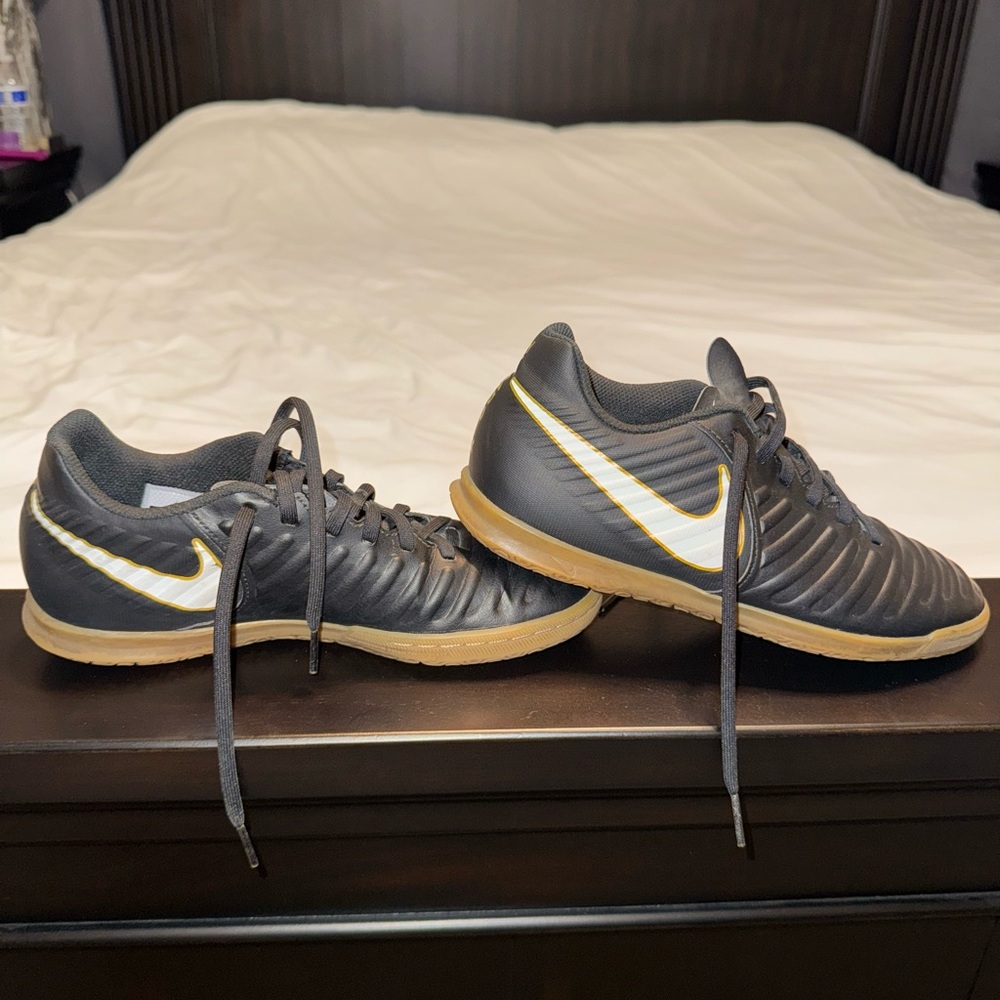 Nike Black and Gold Athletic Shoes with Durable Design